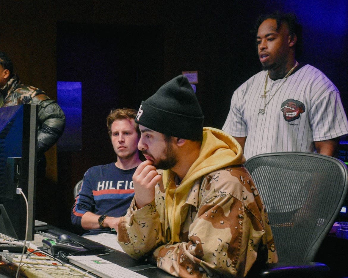 A studio mixing session at the console